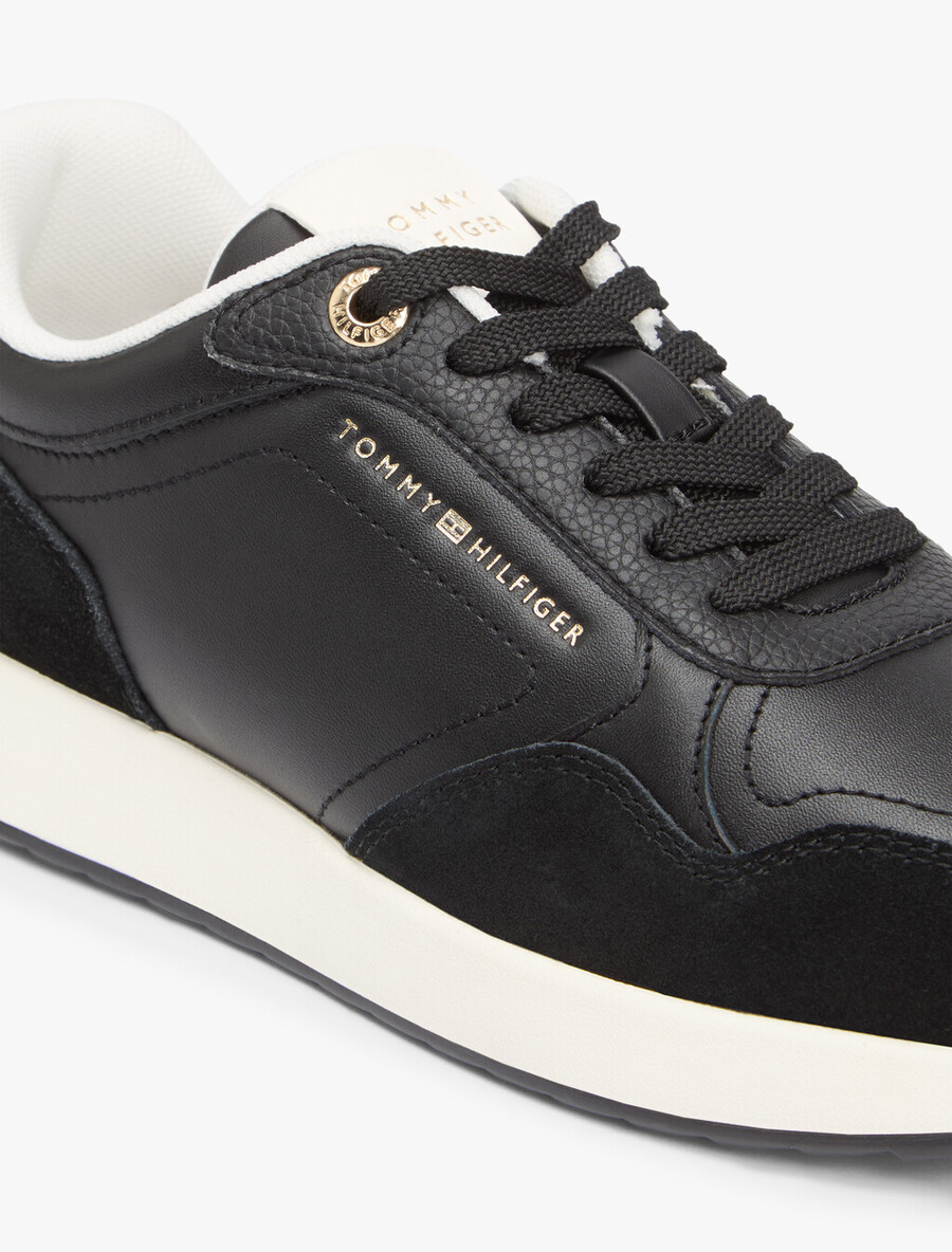 sneaker aus geprägtem th-monogramm-leder