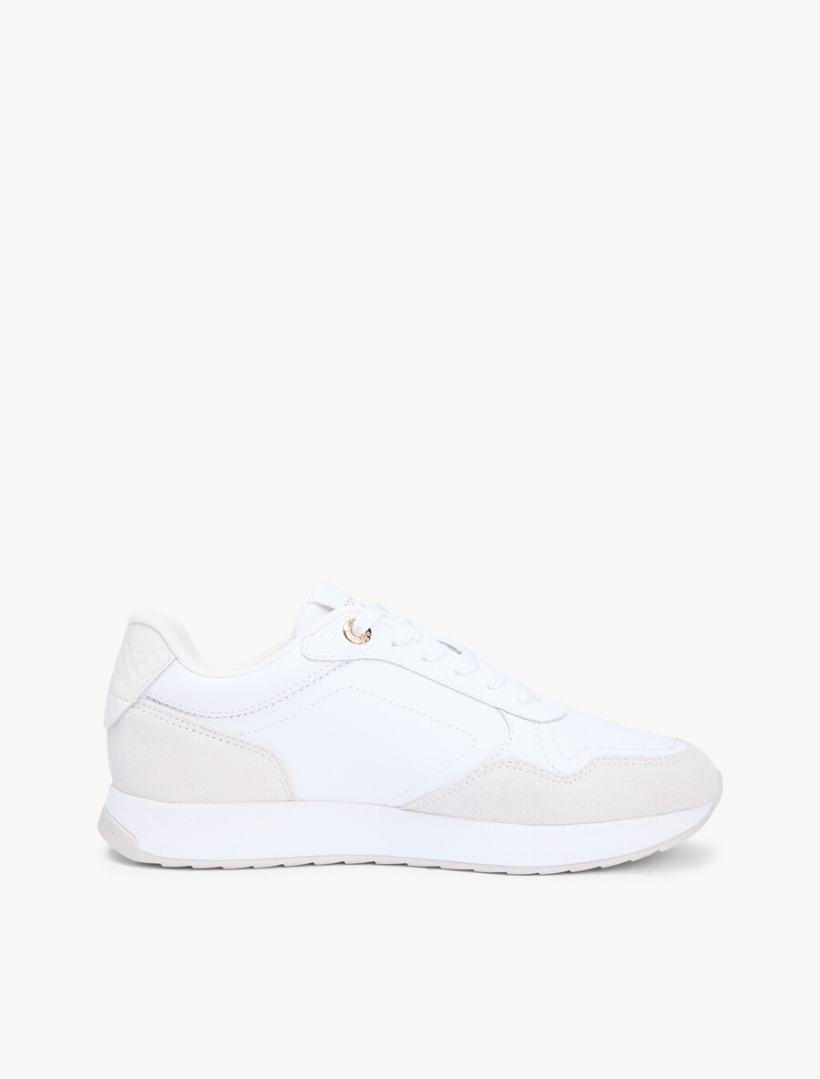 sneaker aus geprägtem th-monogramm-leder