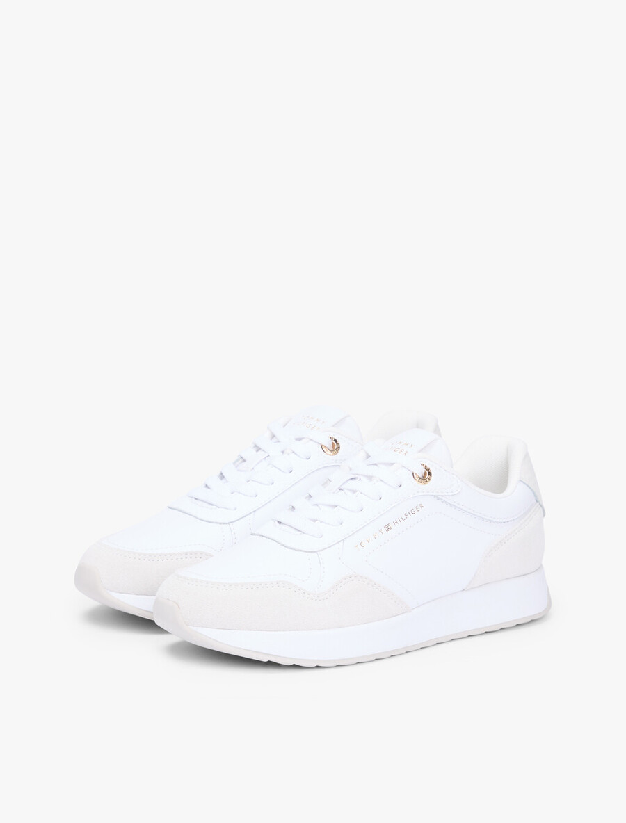 sneaker aus geprägtem th-monogramm-leder
