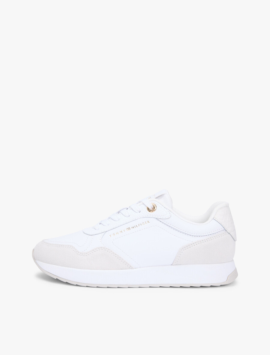 sneaker aus geprägtem th-monogramm-leder